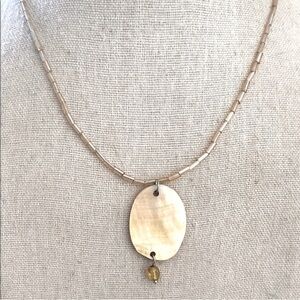 Beautiful shell pendant with crystal on tubular beaded Gold Necklace